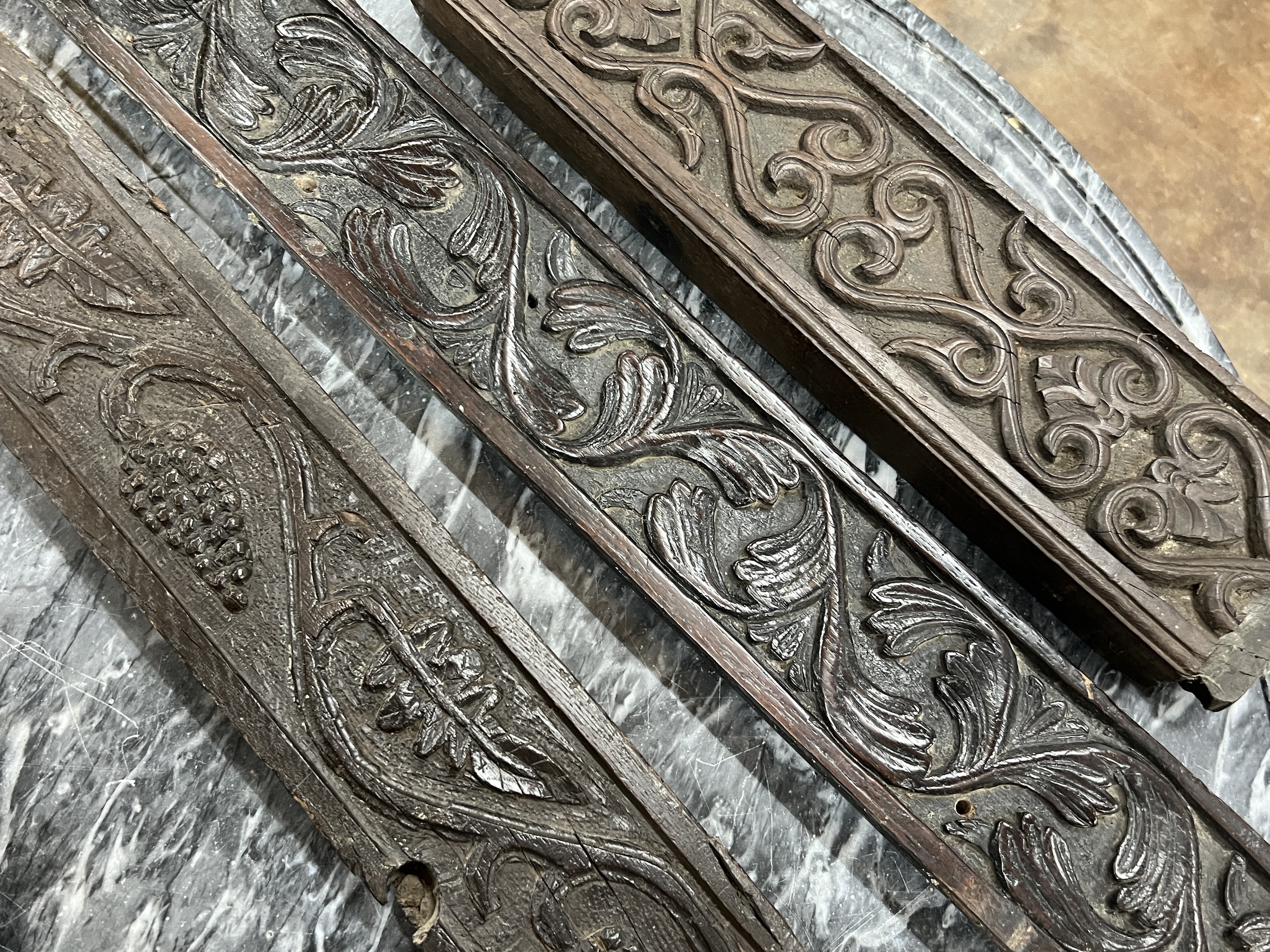 Three 18th century carved oak appliques / stiles, larger height 83cm